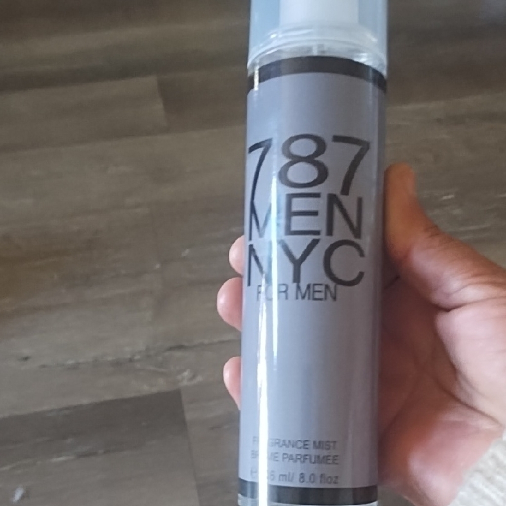 Gray Cylindrical Spray Can with Bold Design
